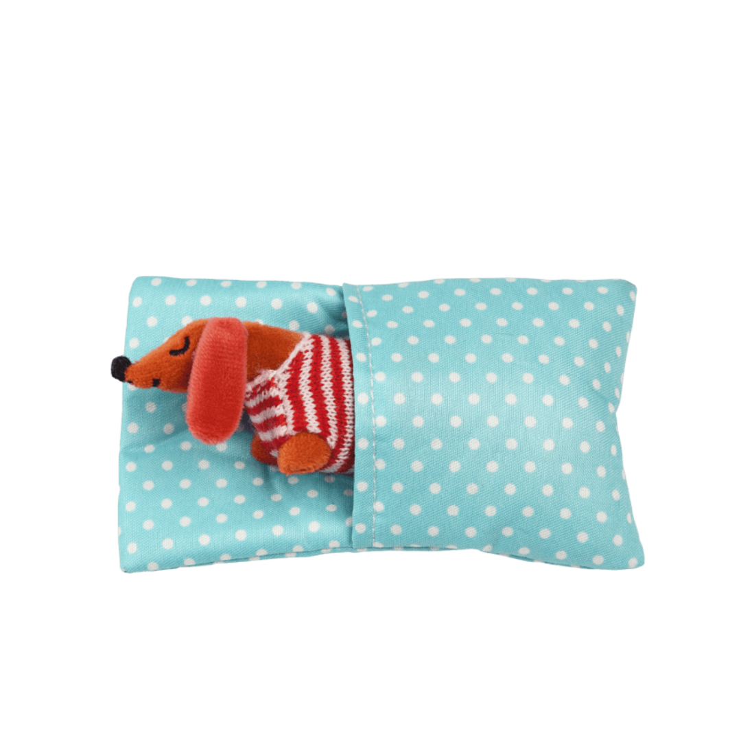 mini sausage dog plush toy in a little box