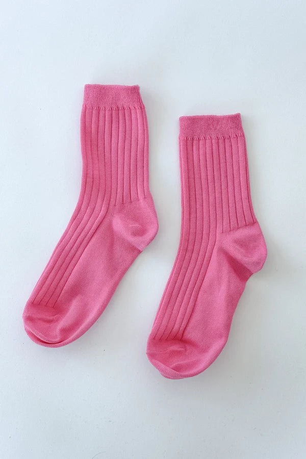 Her bright pink socks