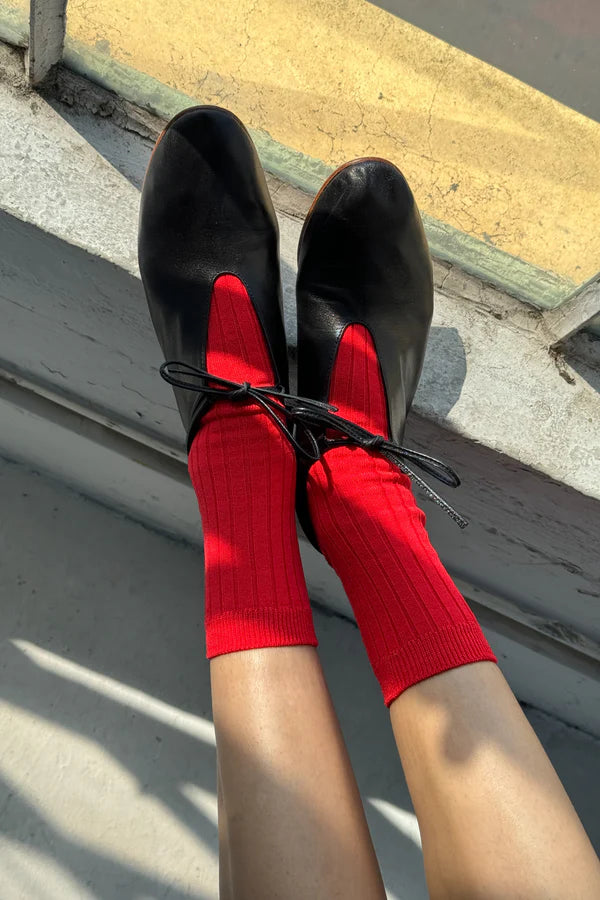 Her classic red socks