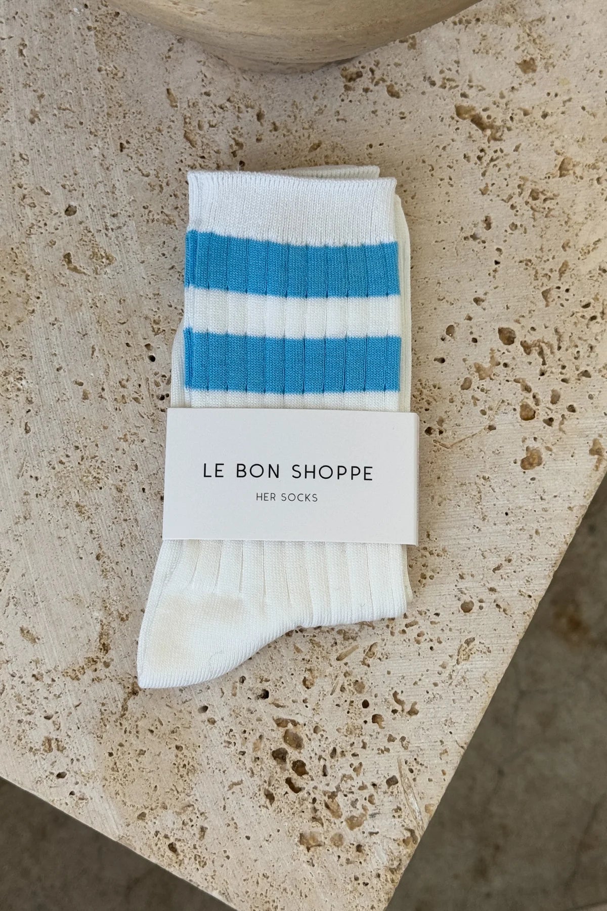 Her varsity blue stripe socks