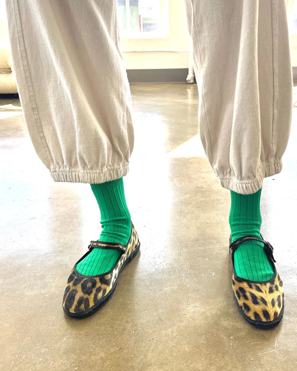 Her kelly green socks