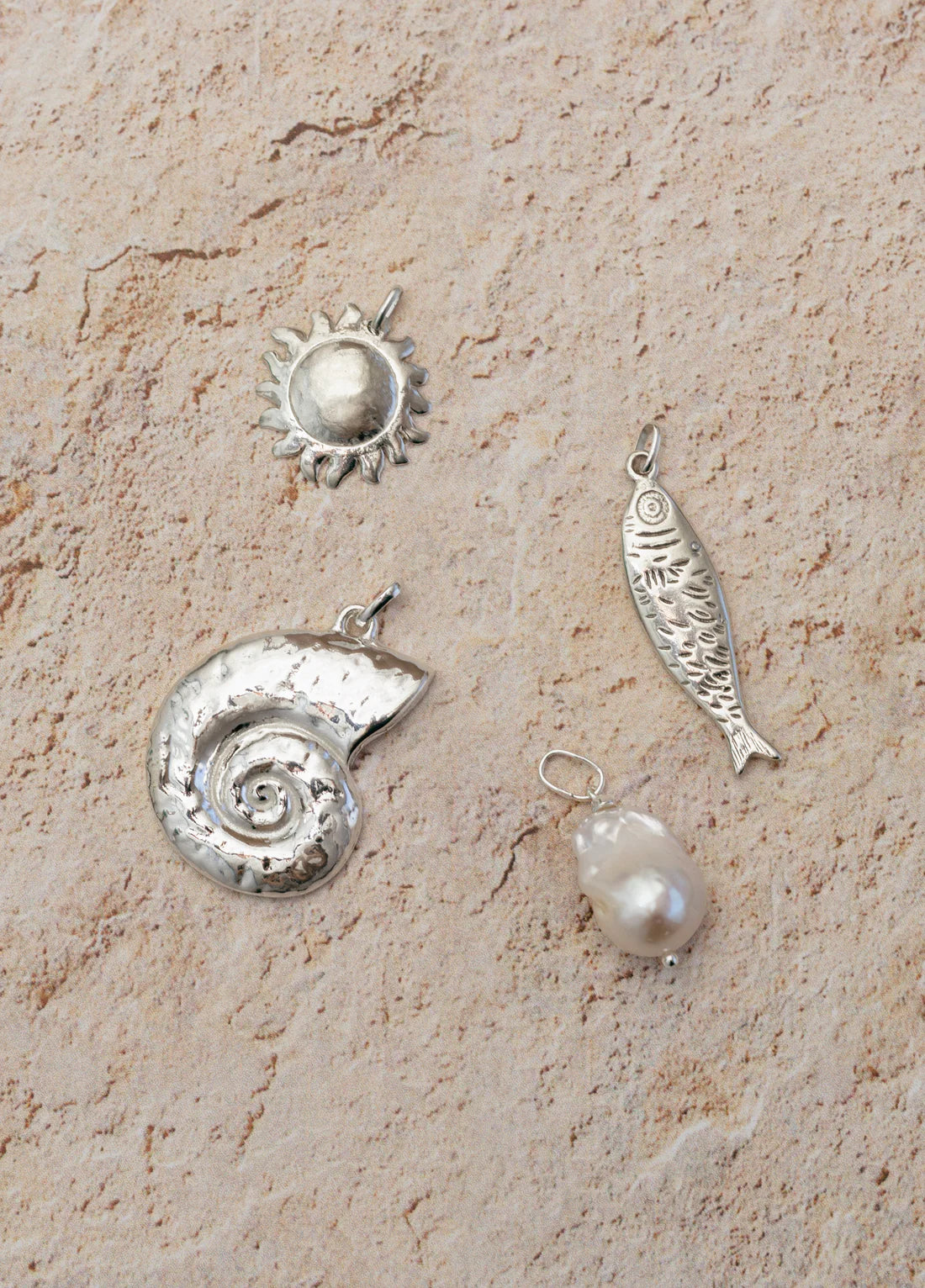SILVER-CHARMS_1100x_8b6562a2-ba44-4bf6-ab1c-ef1d9e8f0b5a.webp