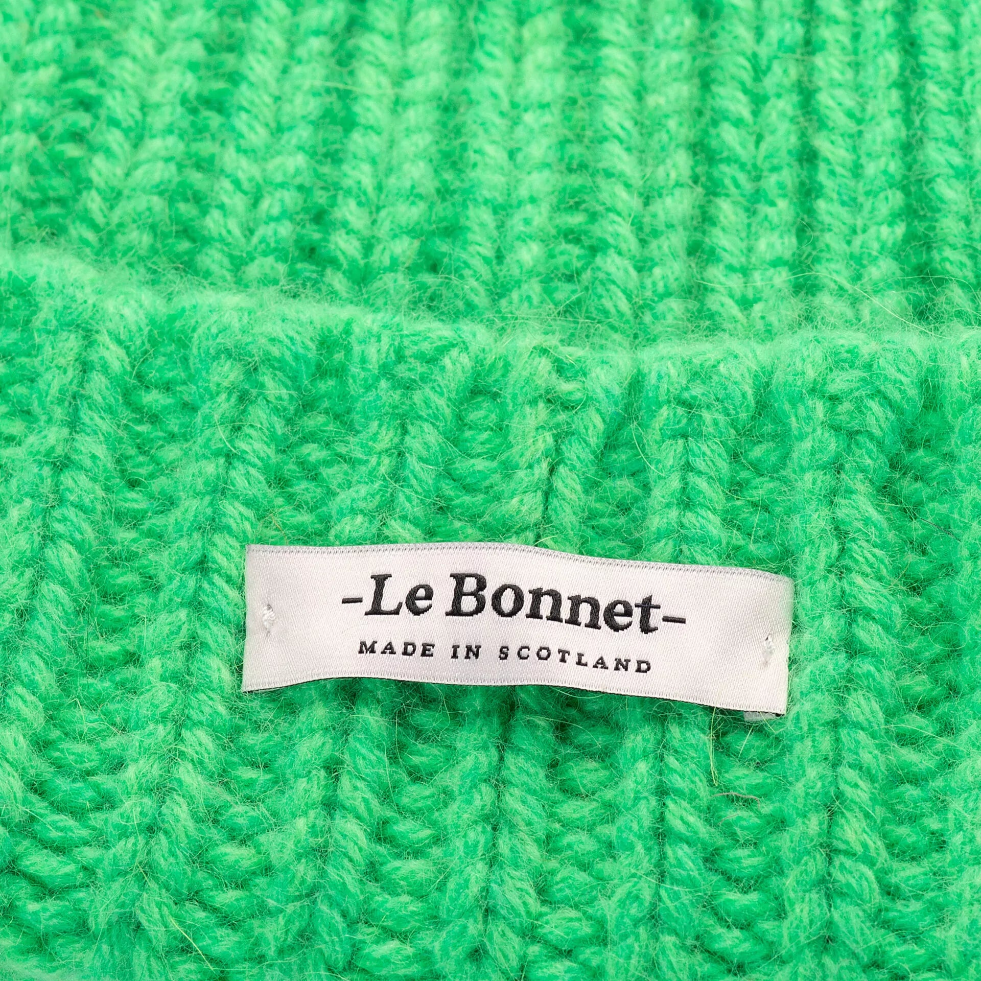 le bonnet logo neon green