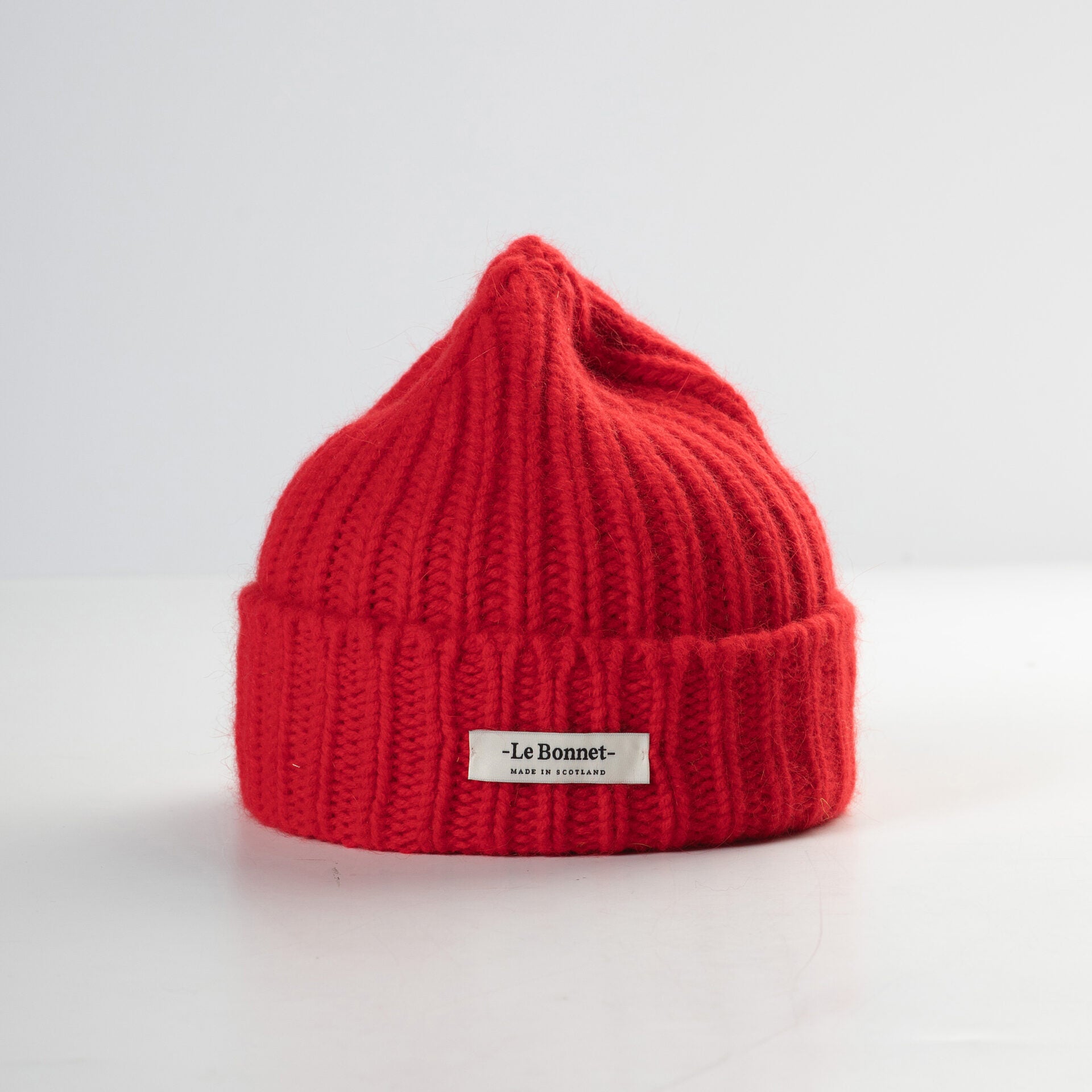 le bonnet logo crimson